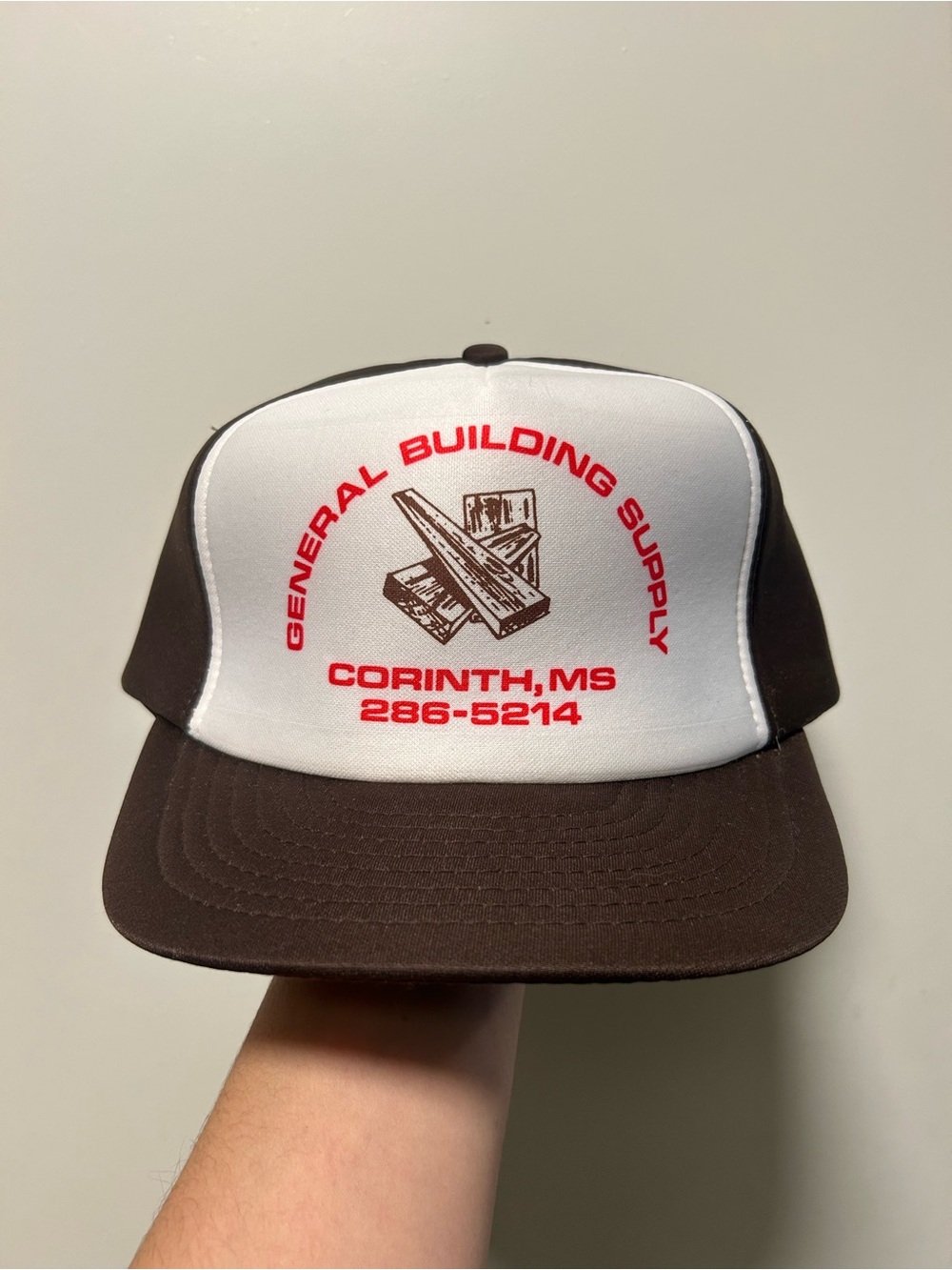 Brown vintage general building supply foam trucker snapback hat